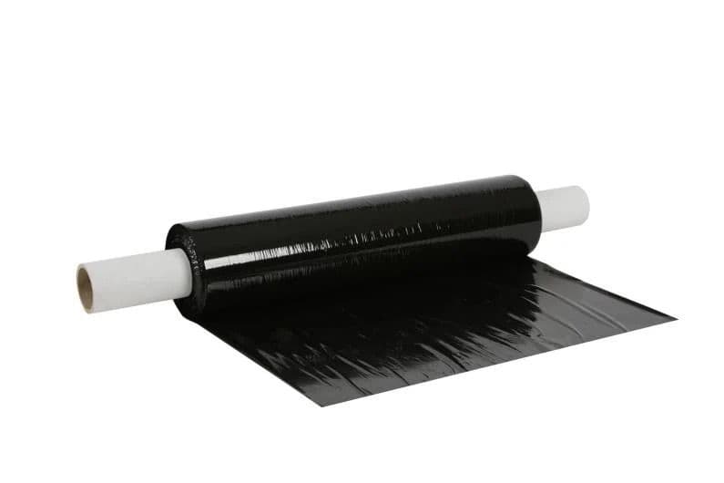 Roll of heavy-duty black opaque stretch film for secure industrial pallet wrapping and UV protection UK